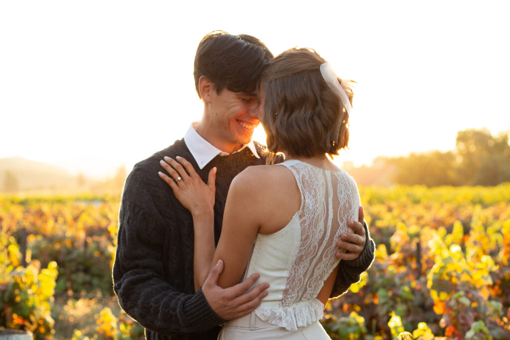 Sweet couple in Napa California at sunrise during an engagement session in one of the best Bay Area engagement photo locations.