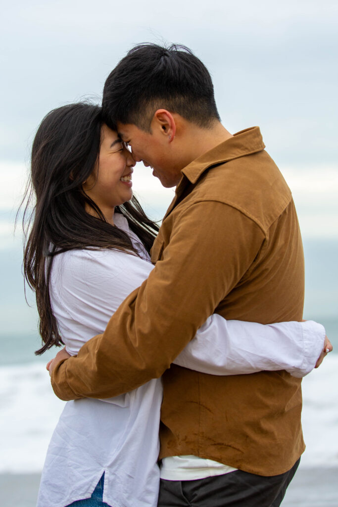 Cozy couple on the beach in California
