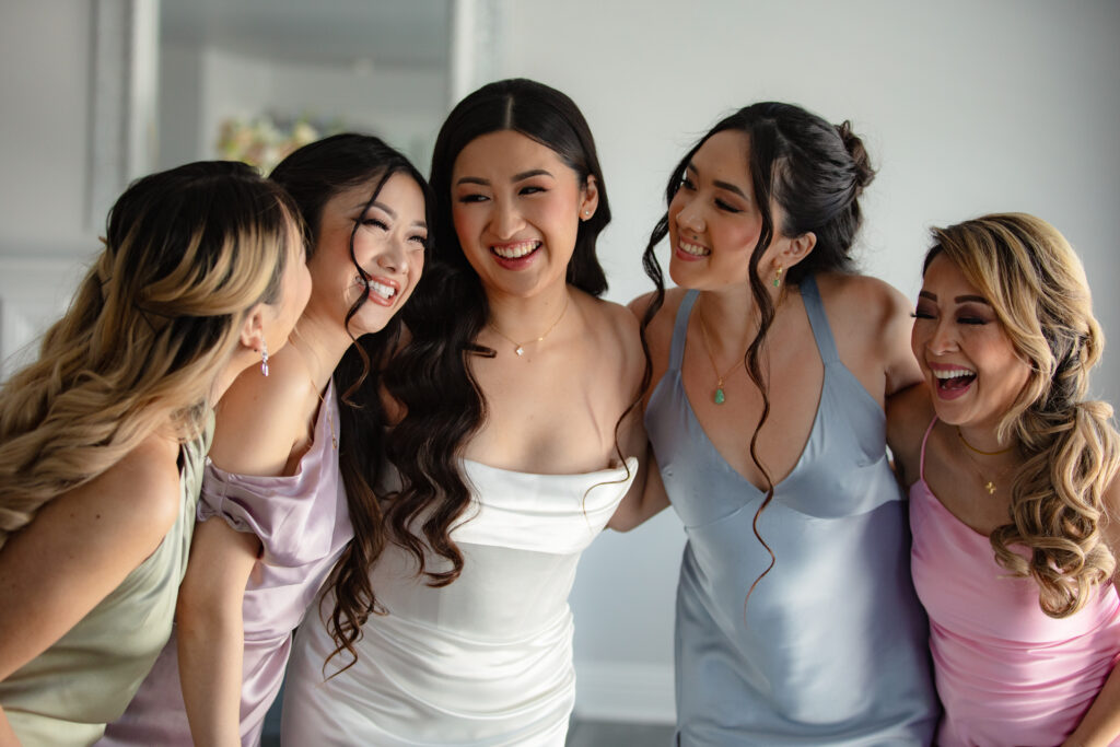 Bridesmaids laughing together