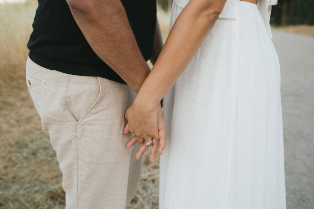Couple holding hands