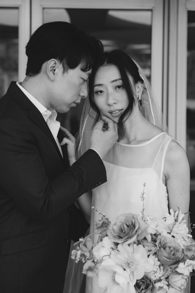 Intimate bride and groom portrait with florals, Bay Area wedding photographer Rose Freedman