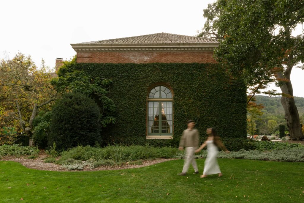 Claude responded: Couple walking in front of ivy-covered Filoli Estate building, Bay Area engagement photographer Rose FreedmanCouple walking in front of ivy-covered Filoli Estate building, Bay Area engagement photographer Rose Freedman