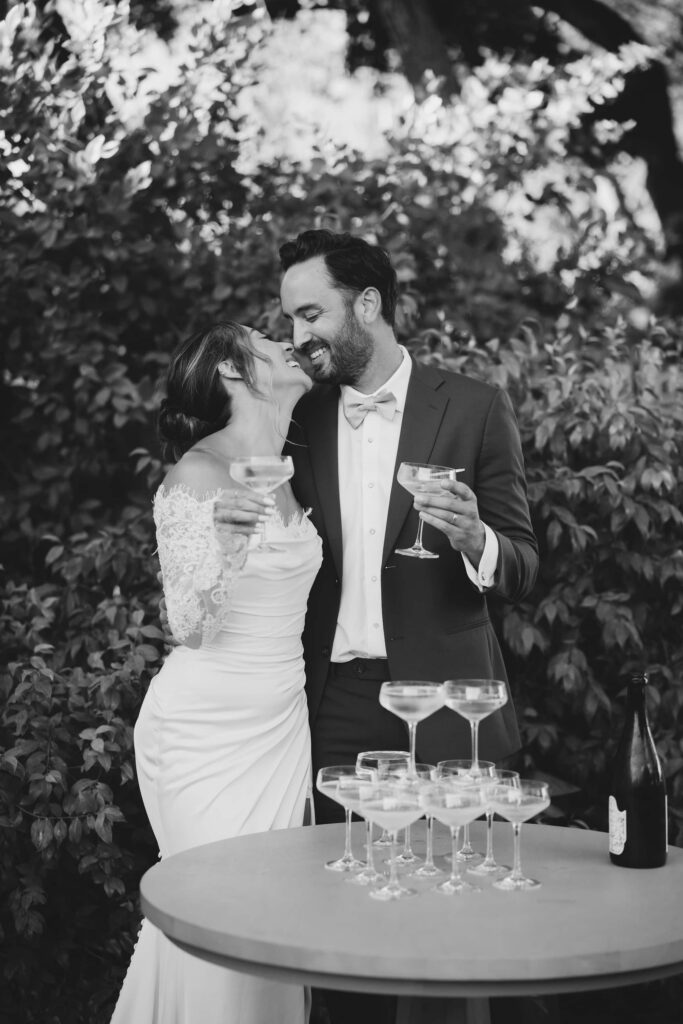 Couple with champagne at San Francisco wedding, Bay Area wedding photographer
