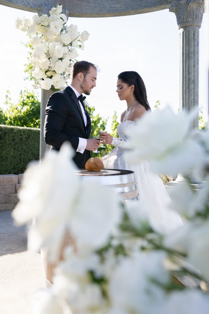 Bride and groom praying together during wedding ceremony at Meritage Resort Napa Valley