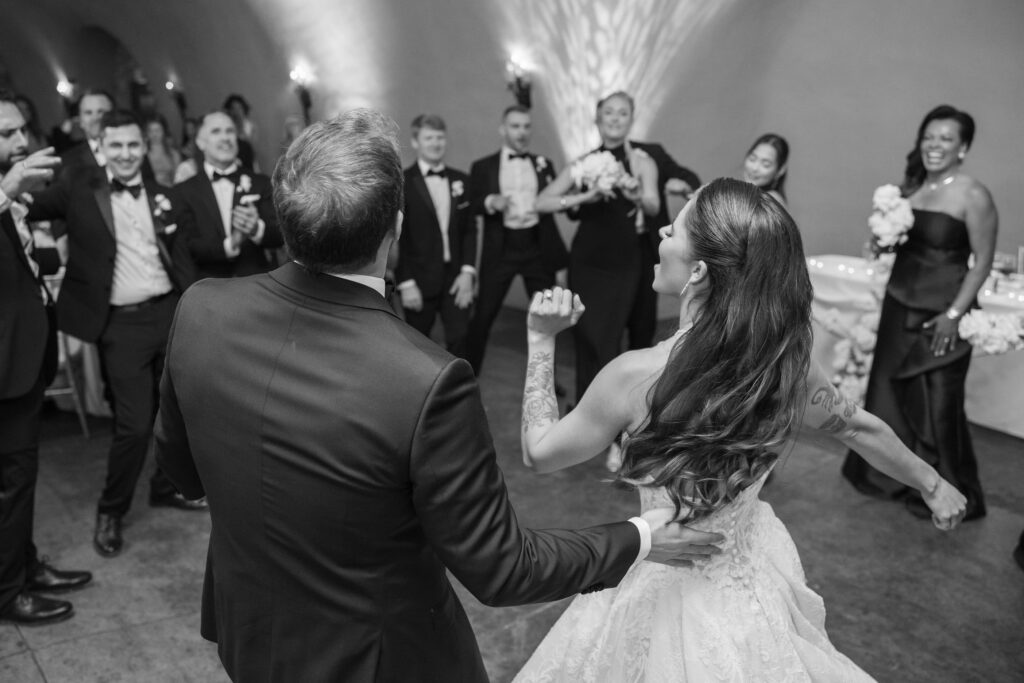 Bride and groom first dance at Meritage Resort Napa cave wedding reception, black and white