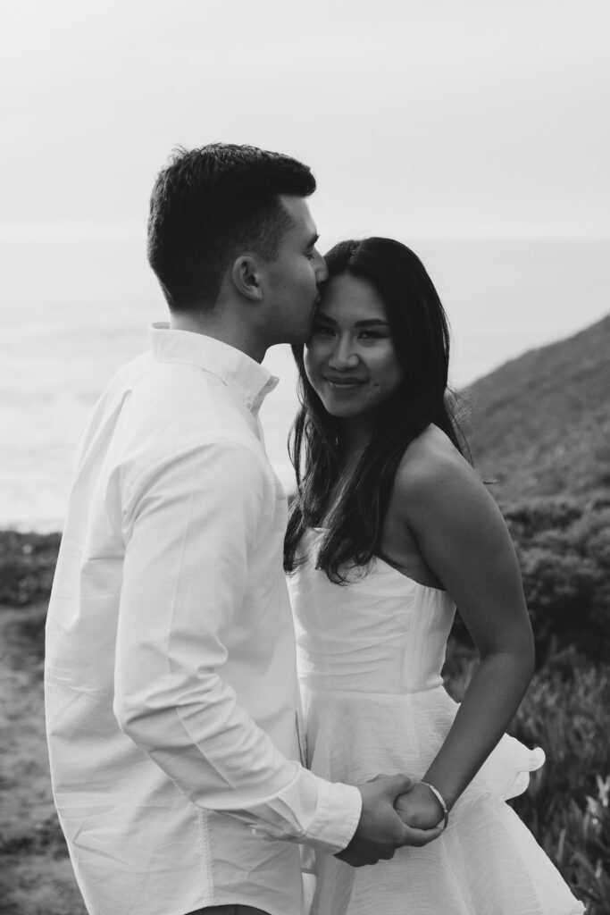 Black and white couple portrait at Rodeo Beach engagement session, Bay Area engagement photographer Rose Freedman