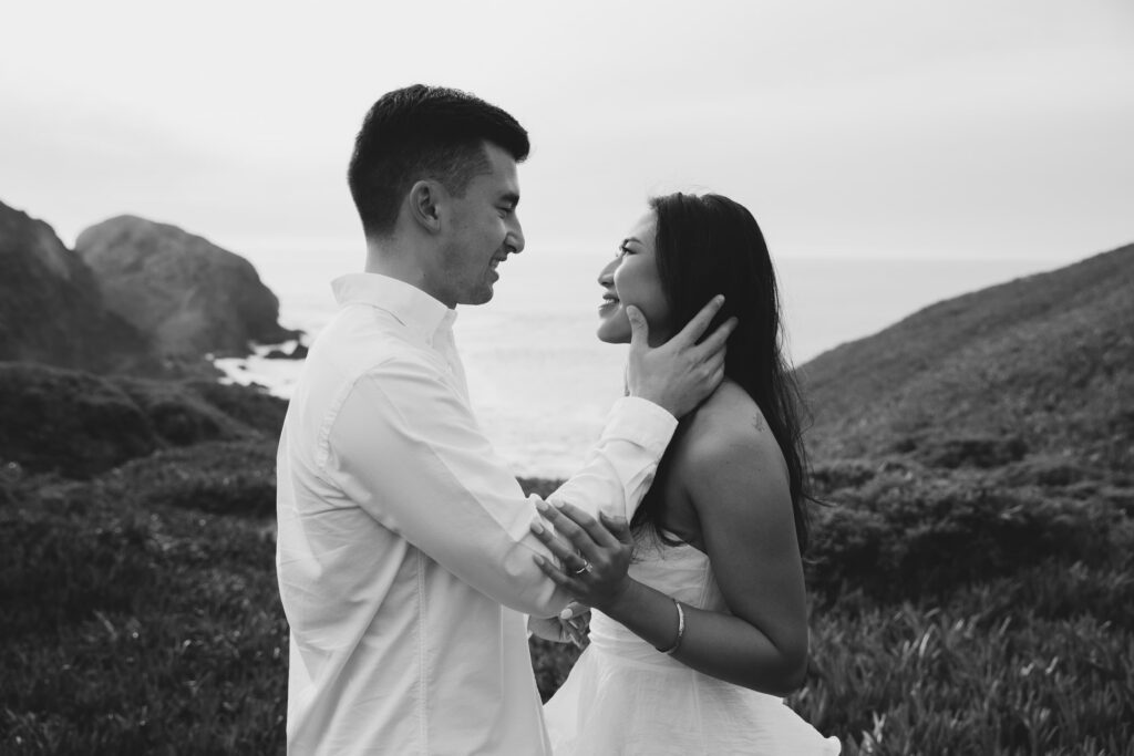 Couple in black and white at Rodeo Beach engagement session, Rodeo Beach engagement photographer Rose Freedman