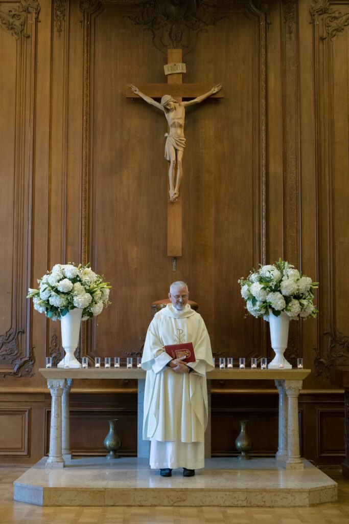 Wedding ceremony at Catholic church altar in San Francisco, James Leary Flood Mansion wedding photographer Rose Freedman