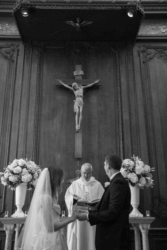 Wedding ceremony at Catholic church altar in San Francisco, San Francisco wedding photographer Rose Freedman