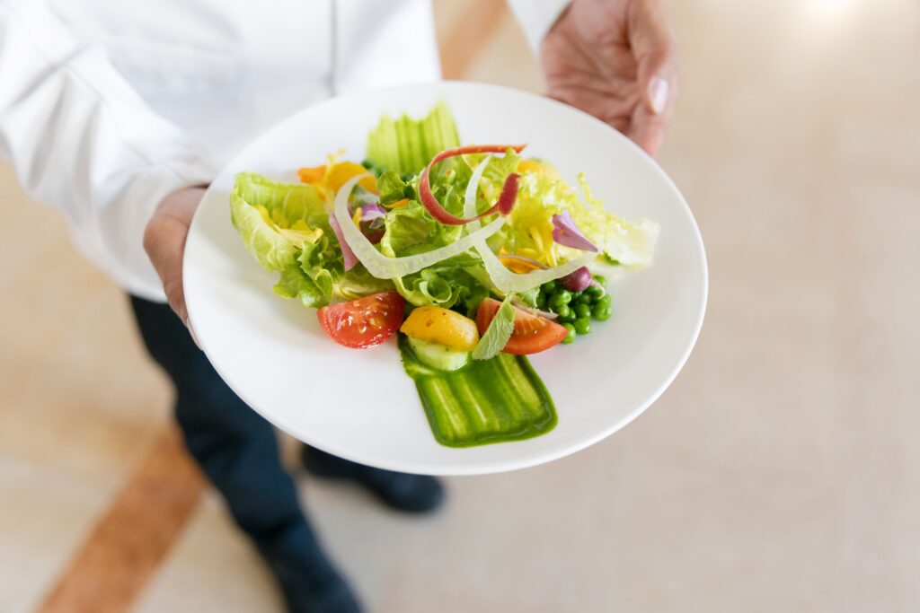 Plated salad course at Flood Mansion wedding reception, San Francisco wedding photographer Rose Freedman