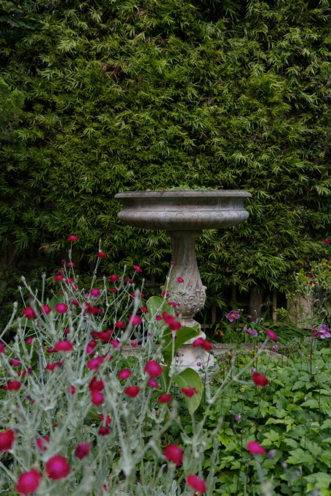 Stone birdbath in garden at Flood Mansion San Francisco wedding venue, Rose Freedman Photography