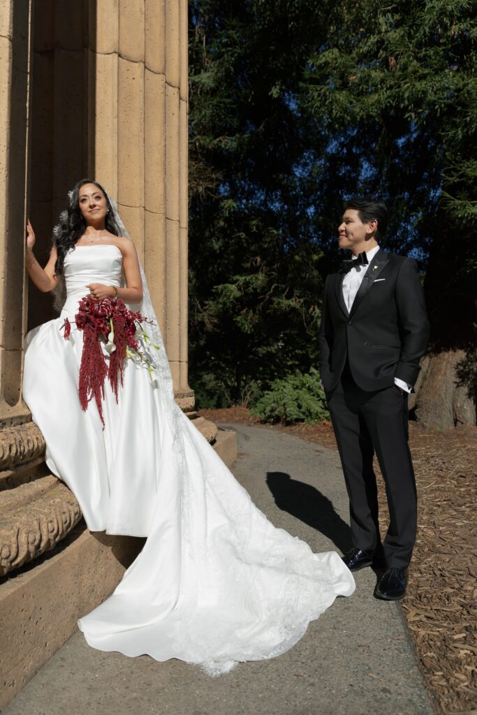 Bride and groom at Palace of Fine Arts columns San Francisco, San Francisco wedding photographer Rose Freedman