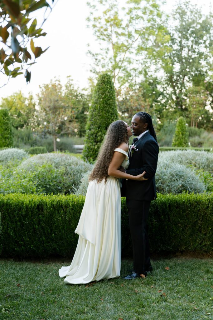 Bride and groom portrait in formal garden at Park Winters at dusk, Park Winters wedding photographer Rose Freedman