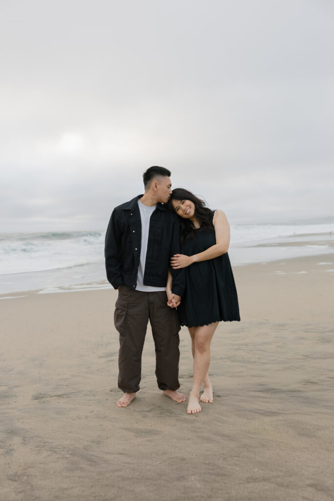 Couple barefoot on Half Moon Bay beach at couples session, Bay Area couples photographer Rose Freedman