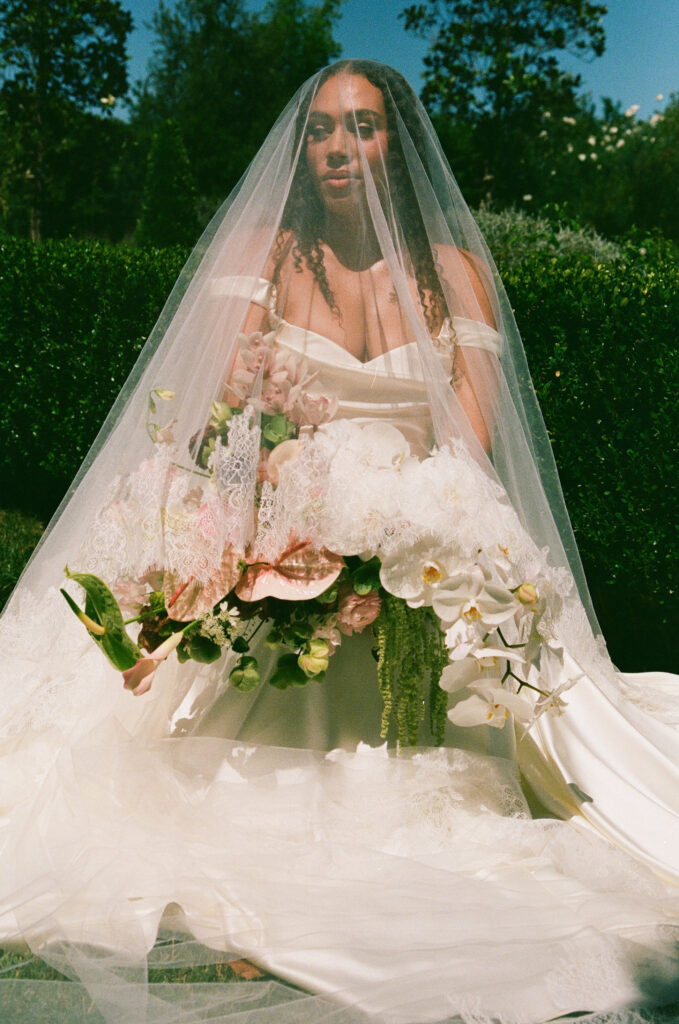 Bride portrait with lace-edged veil and cascading bouquet on 35mm film at Park Winters, Park Winters wedding photographer Rose Freedman