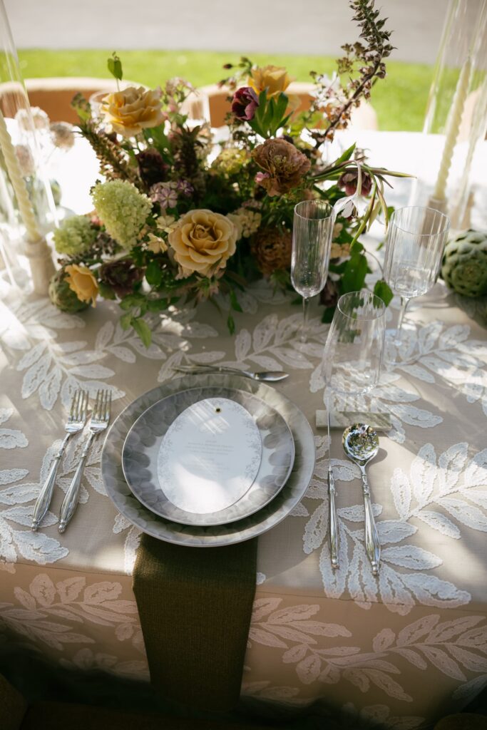 Botanical linen tablescape with pewter charger and floral centerpiece at Holman Ranch, Carmel Valley wedding photographer