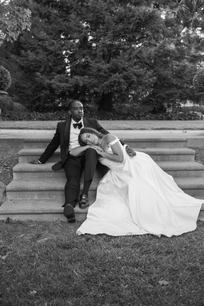 Bride and groom relaxed on stone steps at Park Winters garden, Park Winters wedding photographer Rose Freedman