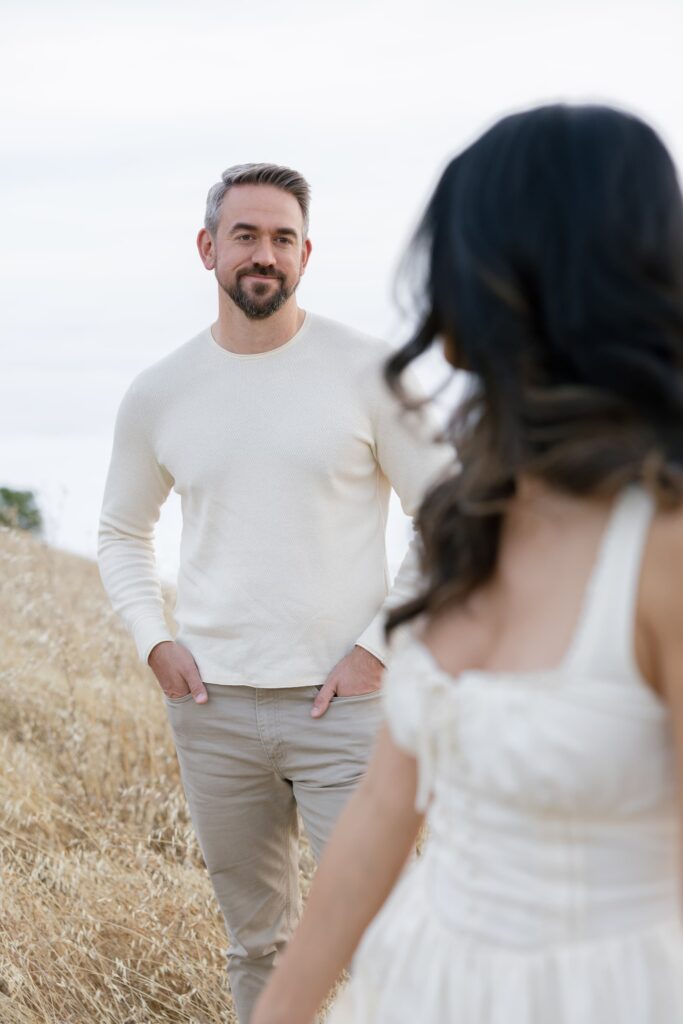 Groom portrait in golden field at Mount Tamalpais engagement session, Bay Area engagement photographer Rose Freedman