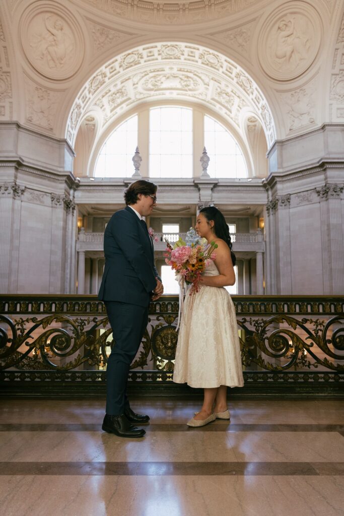 Couple portrait under San Francisco City Hall dome, elopement photography Rose Freedman