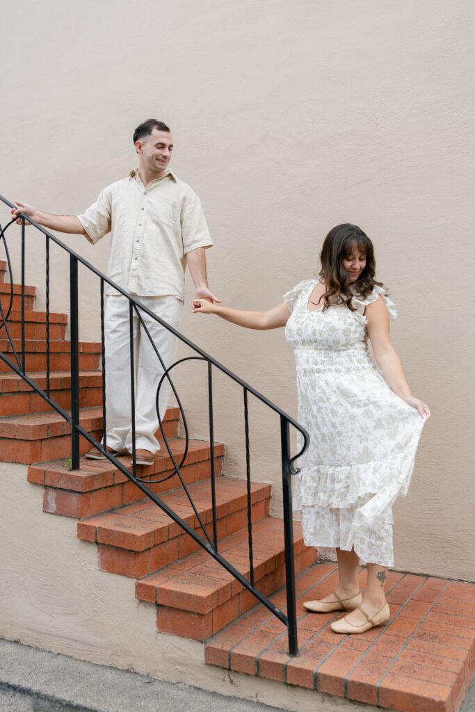 Couple on brick staircase downtown Half Moon Bay, Bay Area anniversary photographer Rose Freedman