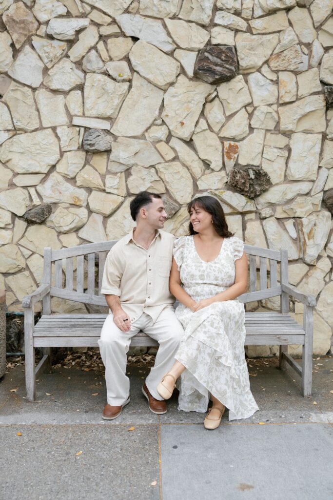 Couple on bench Half Moon Bay downtown, Bay Area couples photographer Rose Freedman