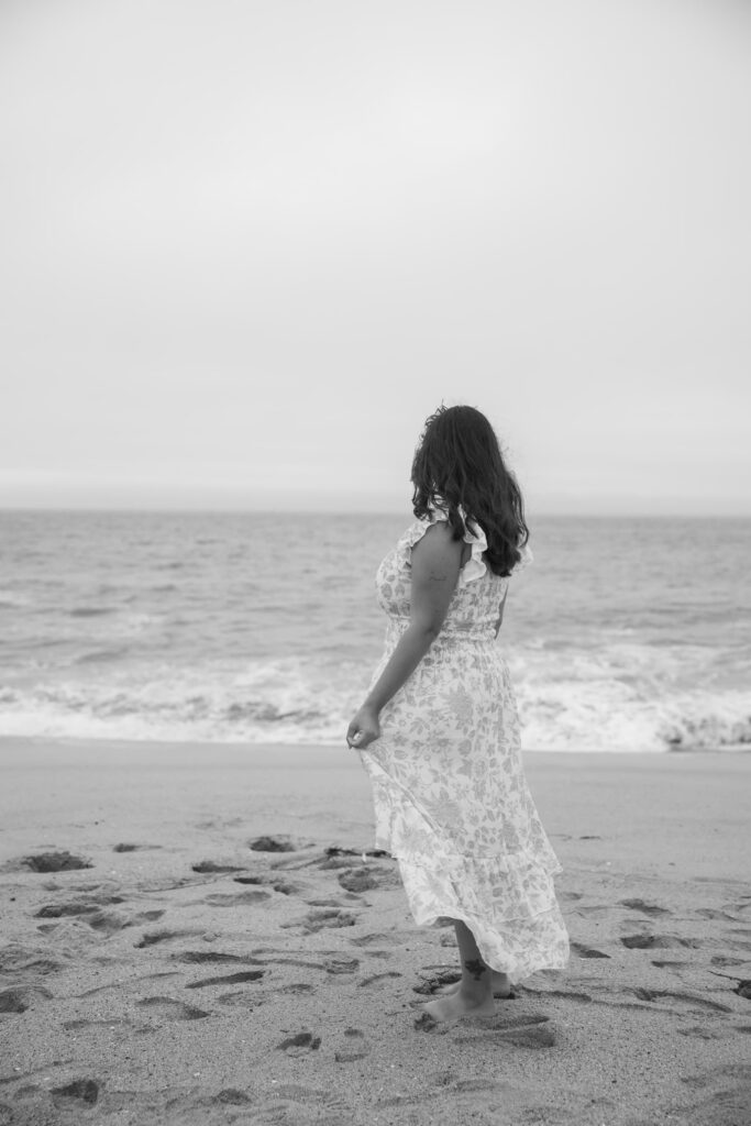 Woman in dress on Half Moon Bay beach, Bay Area photographer Rose Freedman