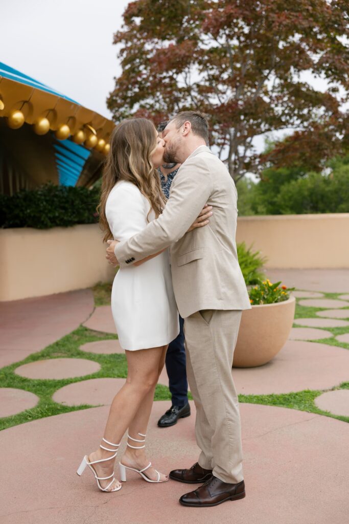 Couple's first kiss after elopement ceremony Marin Civic Center, Marin elopement photographer Rose Freedman