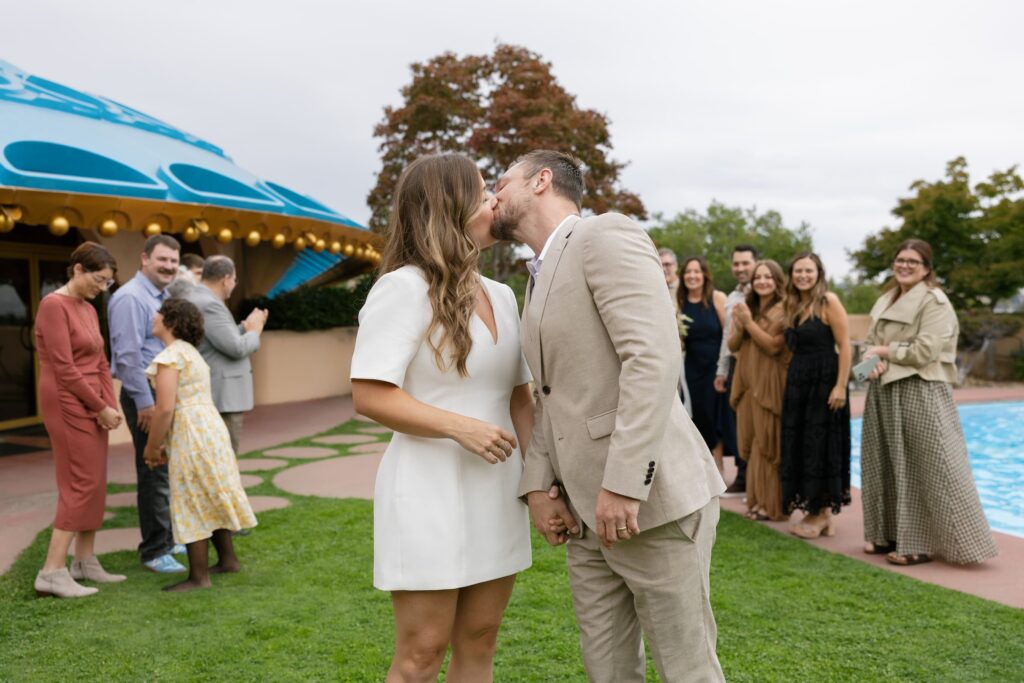 Newlyweds kissing after elopement ceremony at Marin Civic Center, Rose Freedman Photography